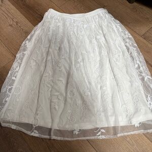 White lace skirt